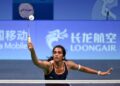 Sindhu Battles Back to Advance at World Championships
