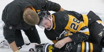 INJURIES IN ICE HOCKEY