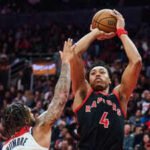 scottie-barnes-of-the-toronto-raptors-goes-up-for-a-shot-over-cam-whitmore-of-the-washington-wizards-in-toronto-on-friday-nov-21-2025