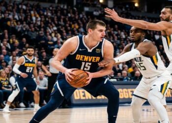 Jokic shines as Nuggets edge Spurs